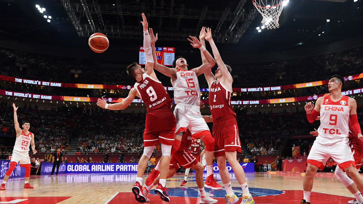 Zhou Qi (Chiny) oraz Mateusz Ponitka i Aleksander Balcerowski (Polska)