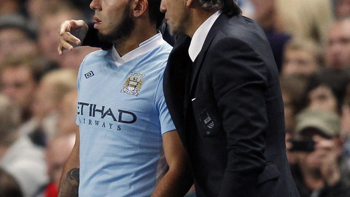 Carlos Tevez (L) i Roberto Mancini (P)