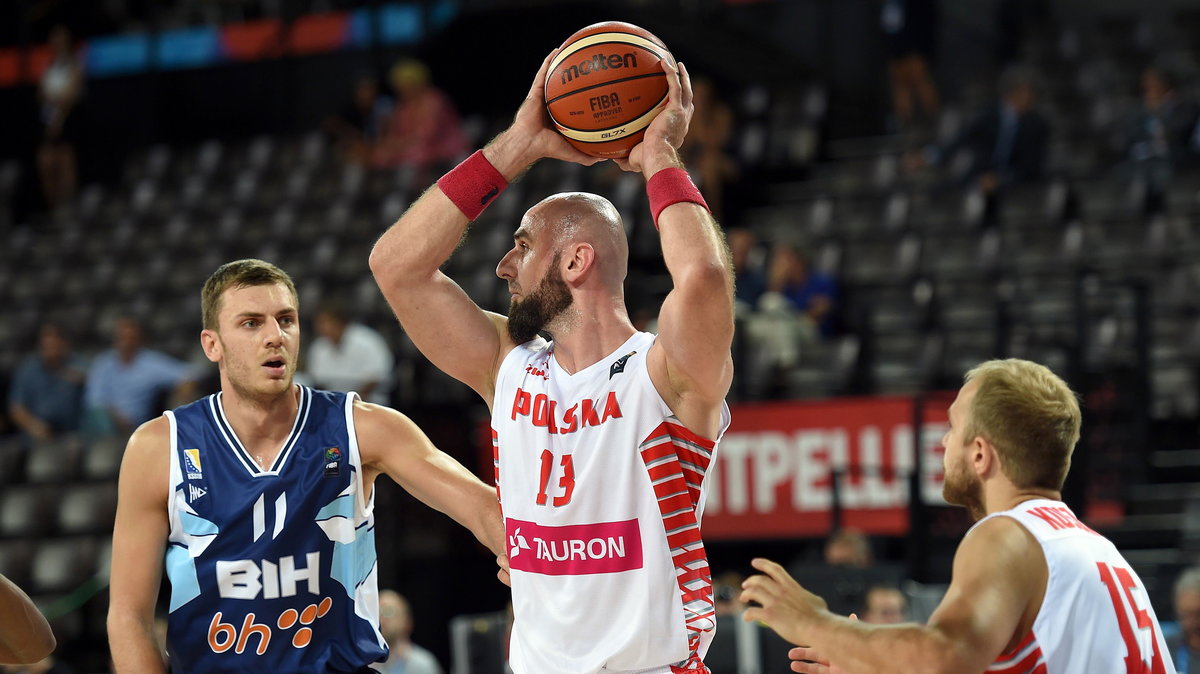 Marcin Gortat (w środku)