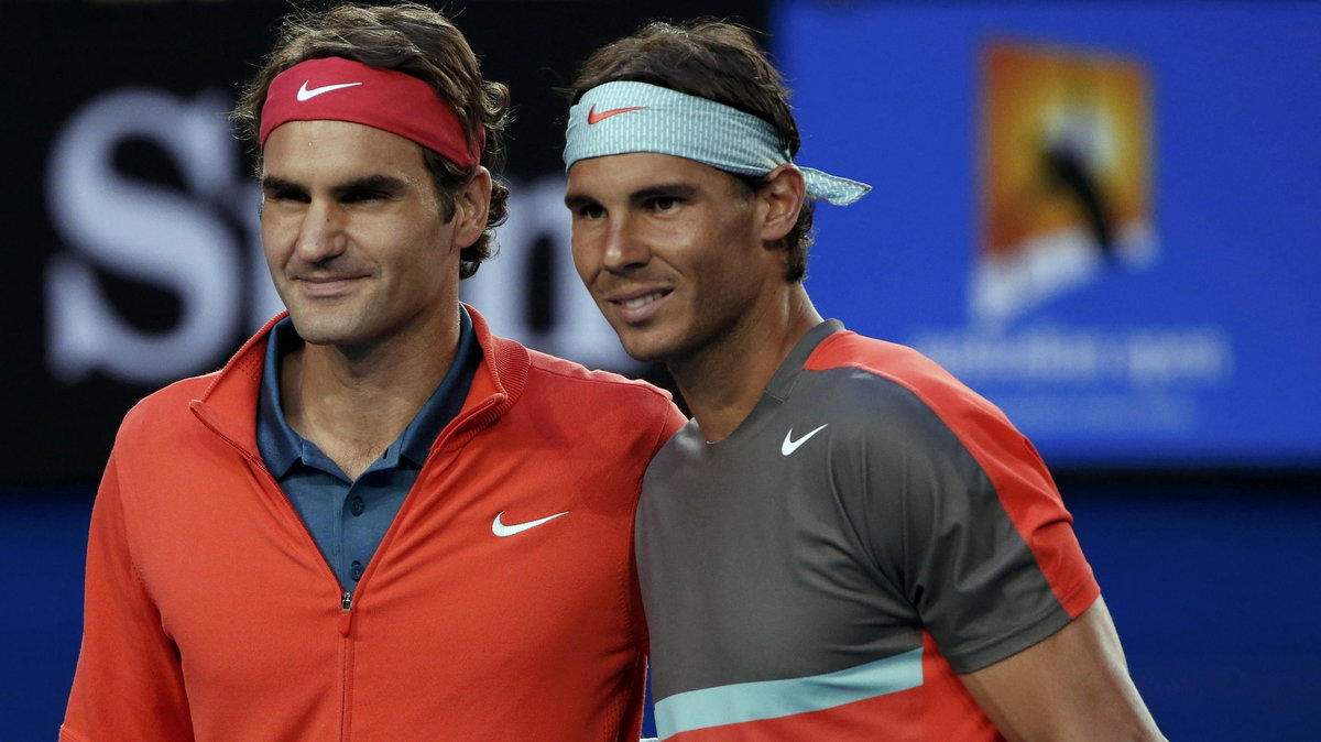 Roger Federer (L) of Switzerland poses for a photo with Rafael Nadal of Spain