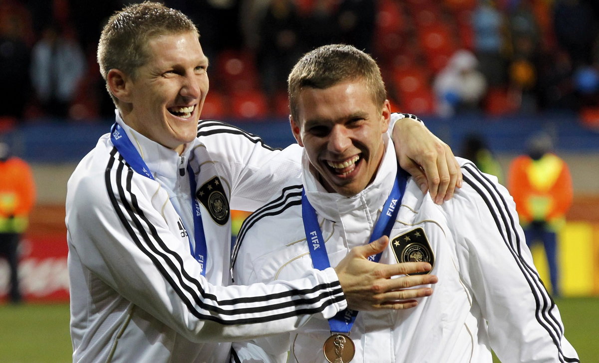 Lukas Podolski (P) i Bastian Schweinsteiger (L)