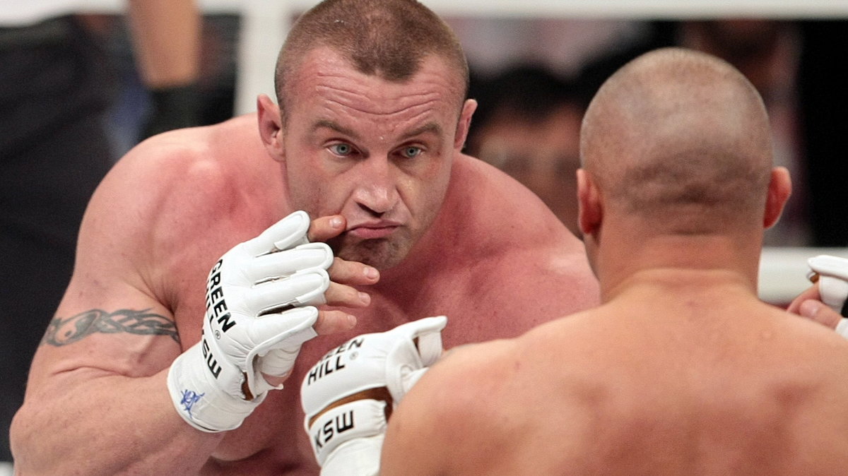 Mariusz Pudzianowski (L)