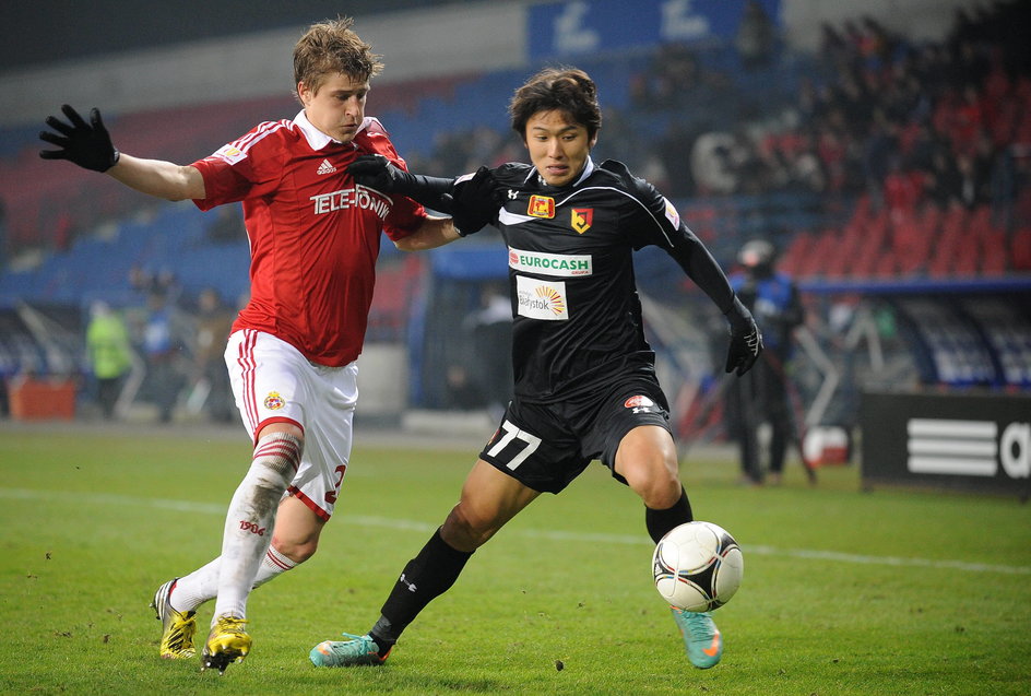 Cezary Wilk (Wisła Kraków) i Min-kyun Kim (Jagiellonia Białystok)