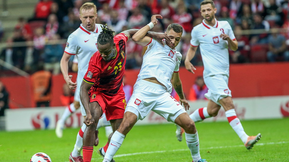 Michy Batshuayi (Belgia) oraz Jakub Kiwior (Polska)