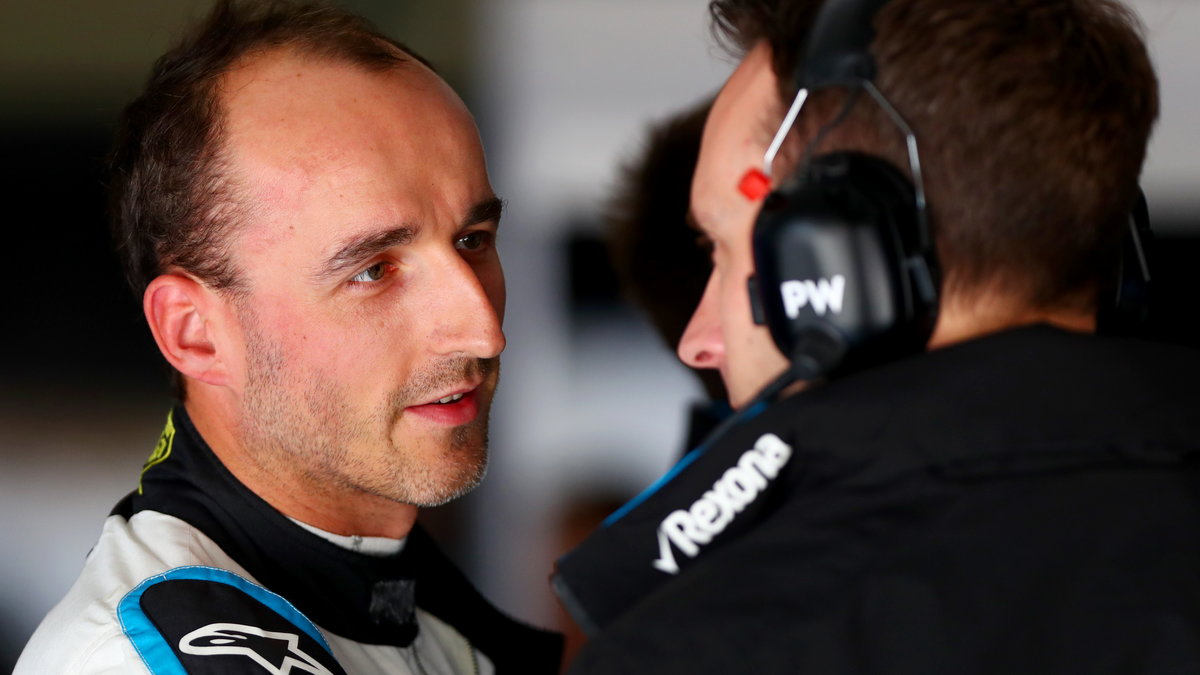 Robert Kubica (L)