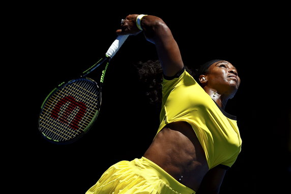 Williams of the U.S. serves during her second round match against Taiwan's Hsieh at the Australian Open tennis tournament at Melbourne Park, Australia