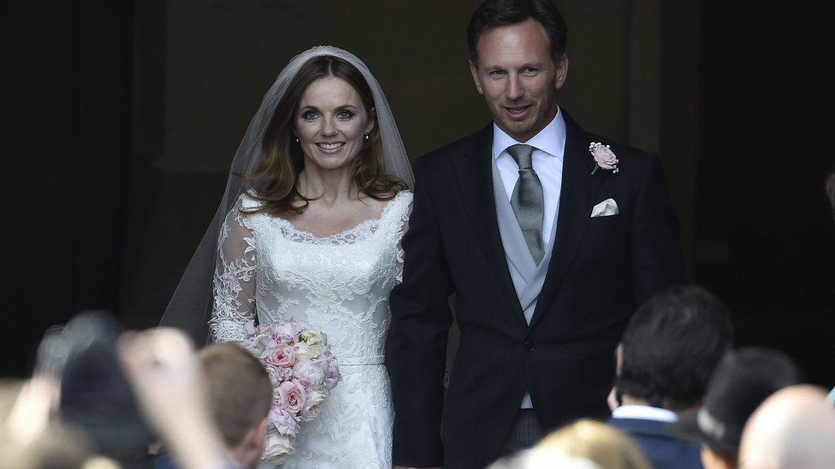 British singer and former member of the band Spice Girls Halliwell leaves with her husband, Horner, Red Bull Formula One team principal, following their wedding at St. Mary's Church at Woburn in southern England