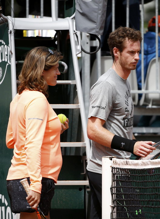 Britain's Murray listen to his coach and former tennis player Mauresmo during a training session for the French Open tennis tournament at the Roland Garros stadium in Paris