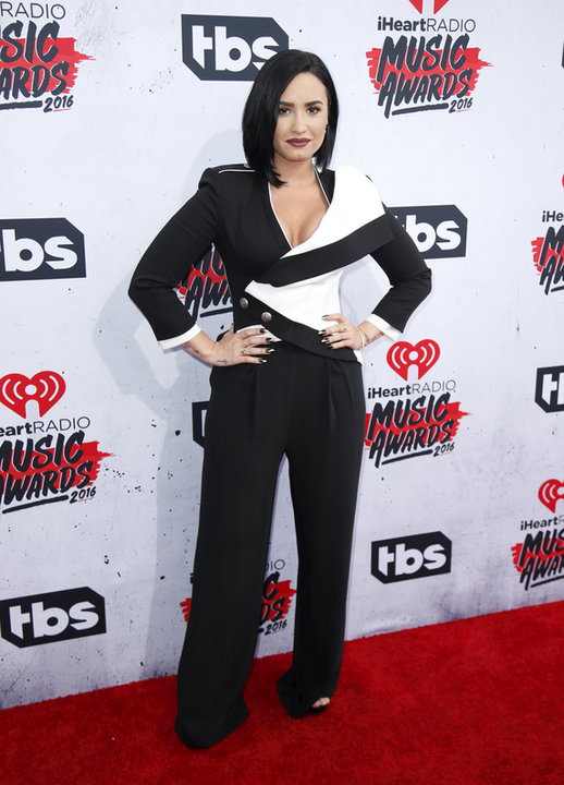 Singer Demi Lovato poses at the 2016 iHeartRadio Music Awards in Inglewood
