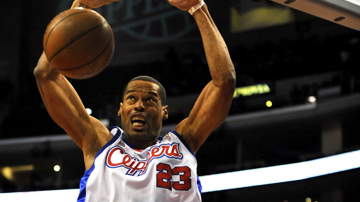 Marcus Camby (L)