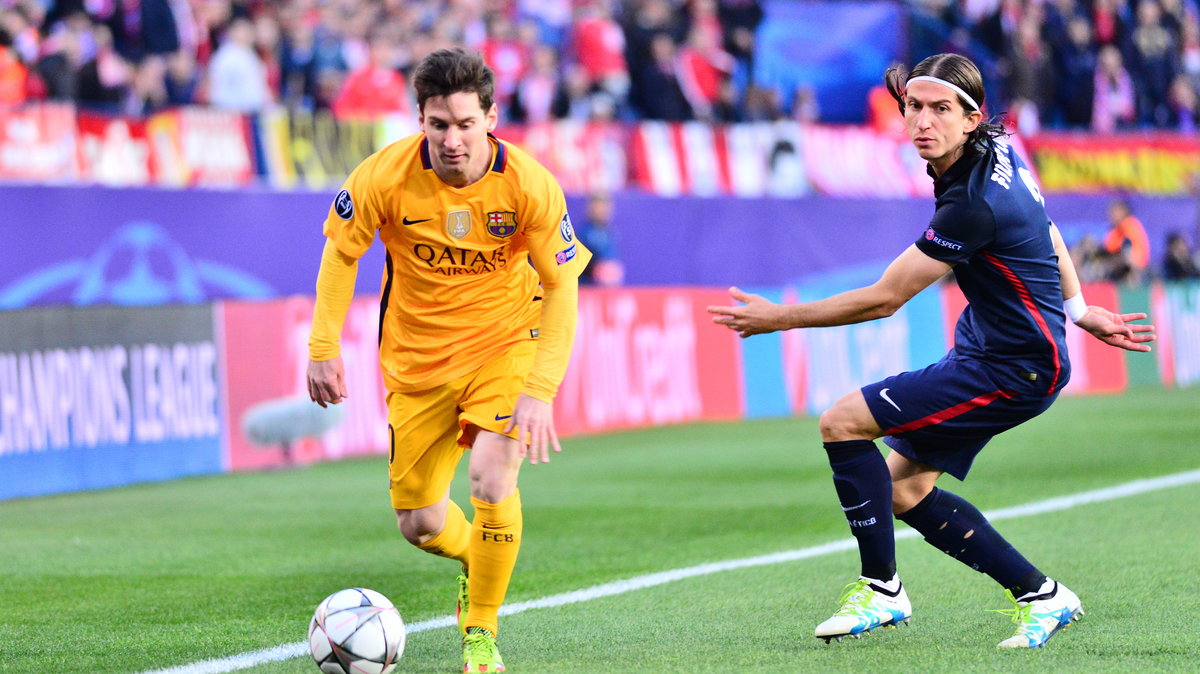 Leo Messi (L) i Filipe Luis