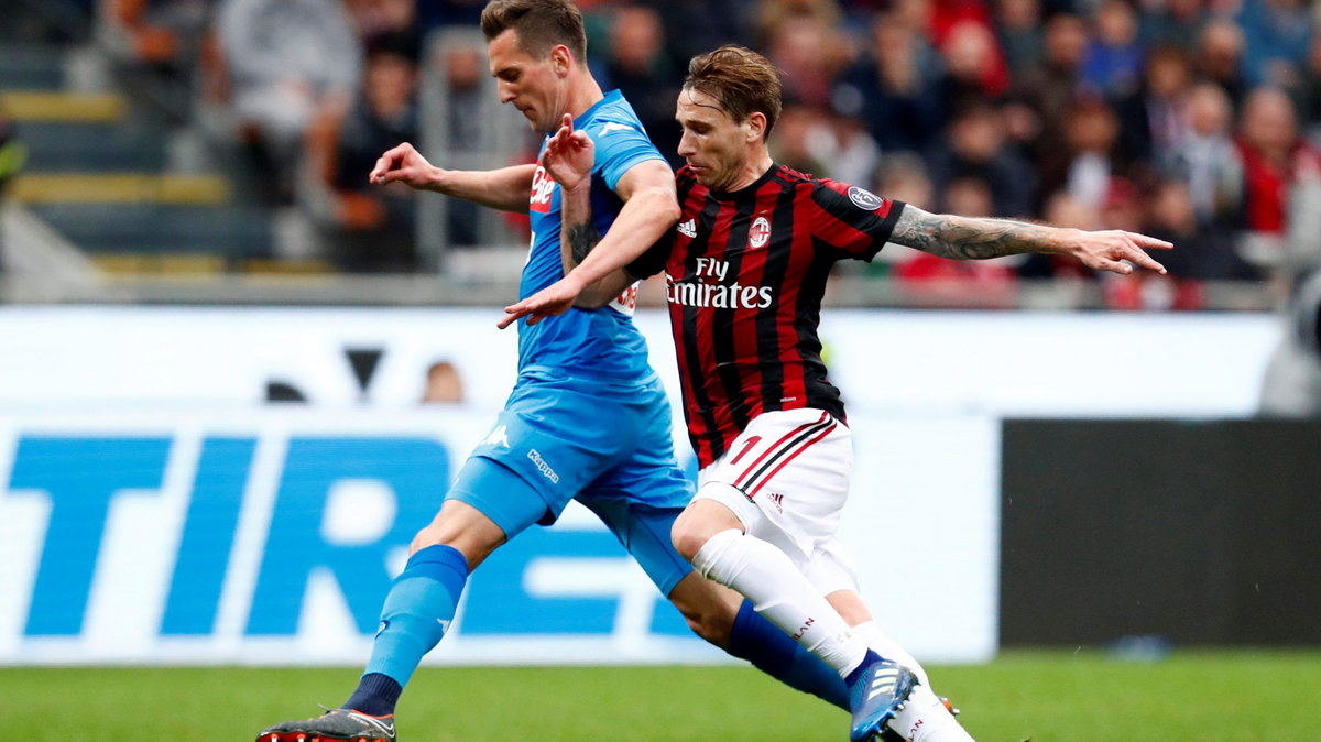 Arkadiusz Milik i Lucas Biglia