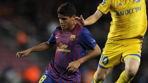 Jonathan Dos Santos (L)