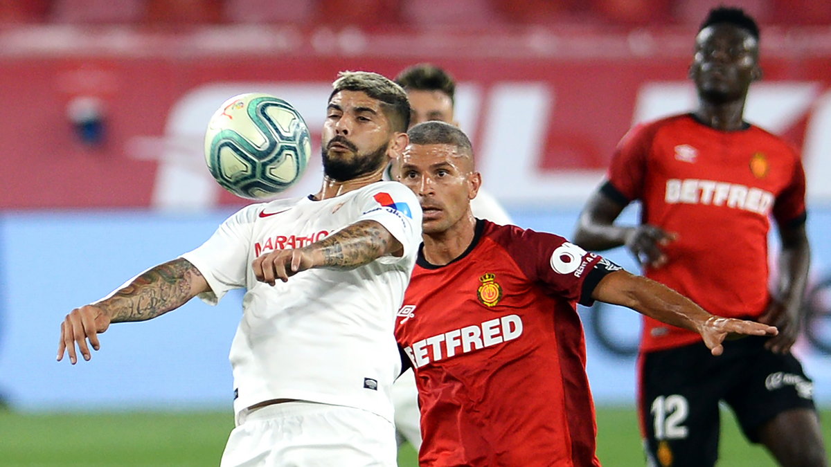 Ever Banega (Sevila) i Salva Sevilla (Mallorca)