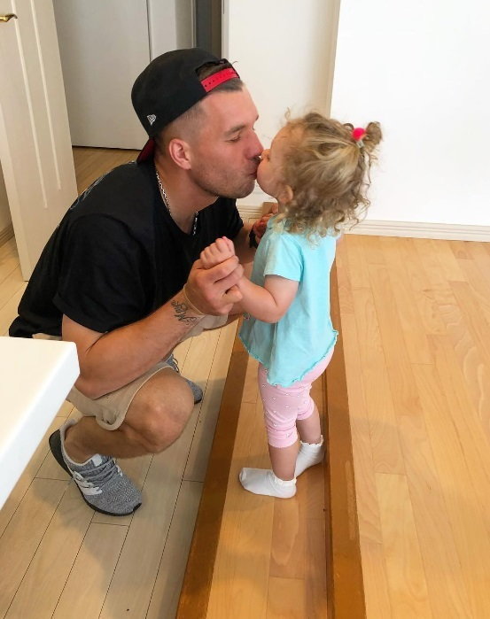 Lukas Podolski z córką
