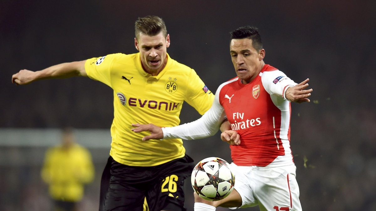 Łukasz Piszczek i Alexis Sanchez