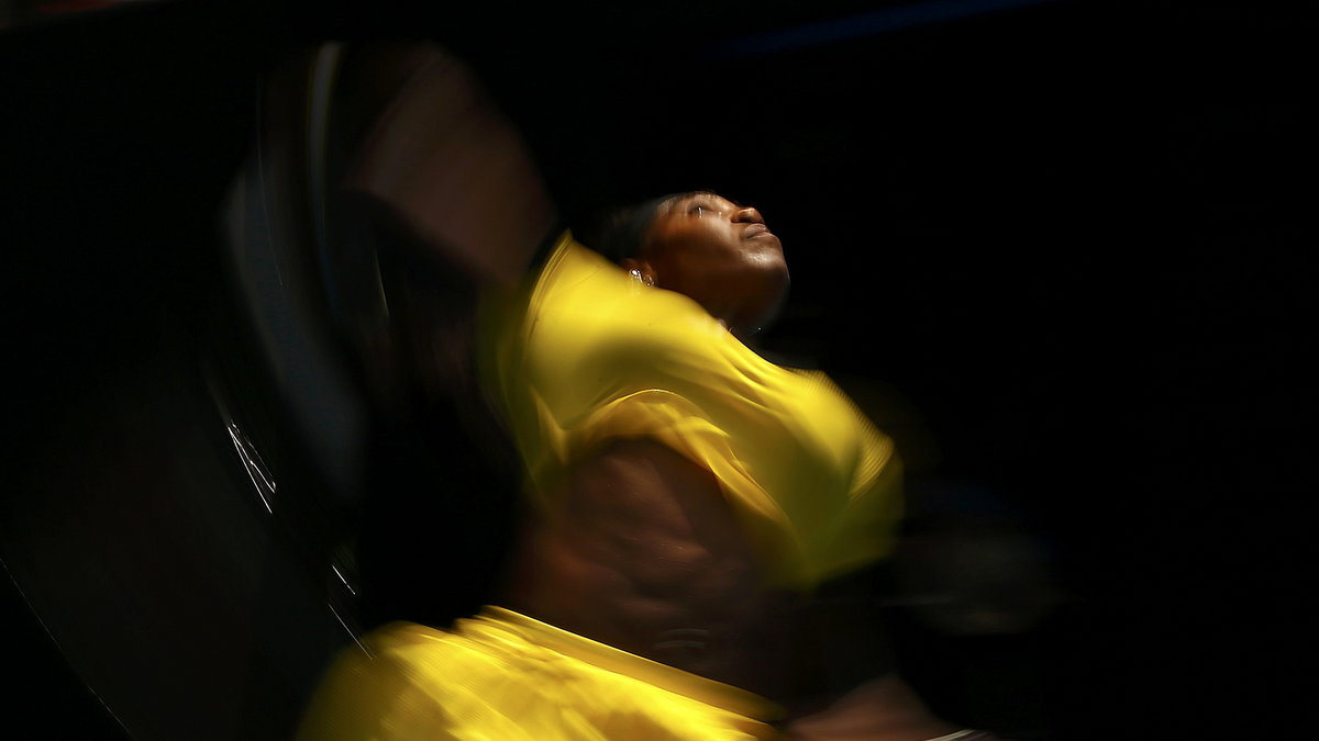 Williams of the U.S. serves during her quarter-final match against Russia's Sharapova at the Australian Open tennis tournament at Melbourne Park