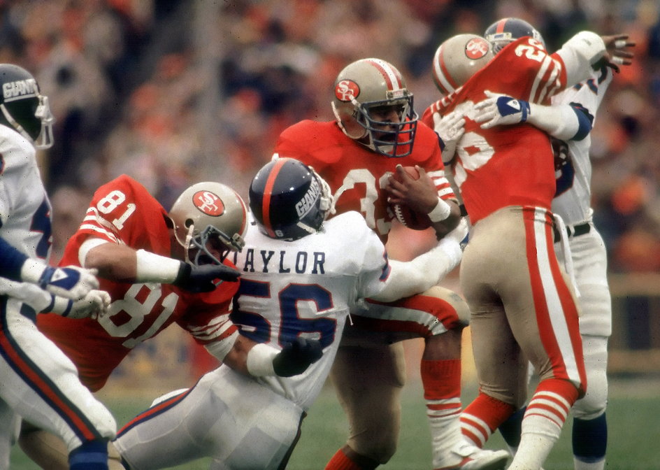 Lawrence Taylor (biała koszulka). (29.12.1984 r., New York Giants vs San Francisco).