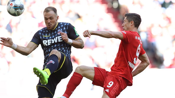 Rafael Czichos (FC Koeln) i Robert Lewandowski (Bayern)