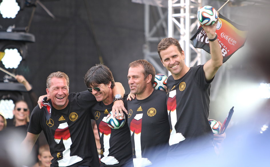 Andreas Koepke, Joachim Loew, Hansi Flick i Oliver Bierhoff po powrocie z mundialu w Brazylii (2014)