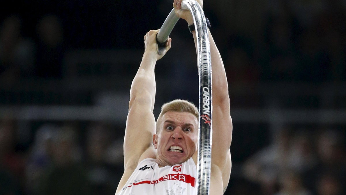 Lisek of Poland competes in the men's pole vault event during the IAAF World Indoor Athletics Championships in Portland