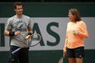 Britain's Murray listen to his coach and former tennis player Mauresmo during a training session for the French Open tennis tournament at the Roland Garros stadium in Paris