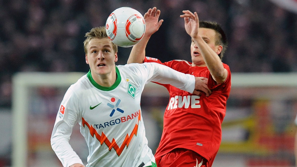 Sławomir Peszko (P) w meczu z Werderem Brema