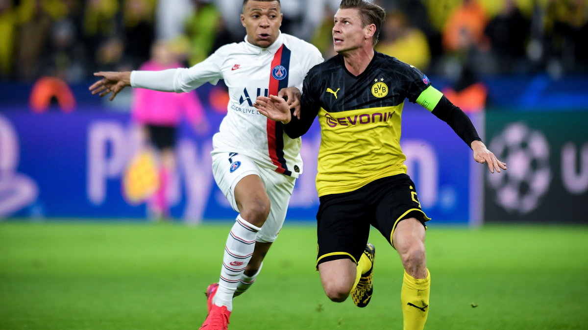 Kylian Mbappe i Łukasz Piszczek