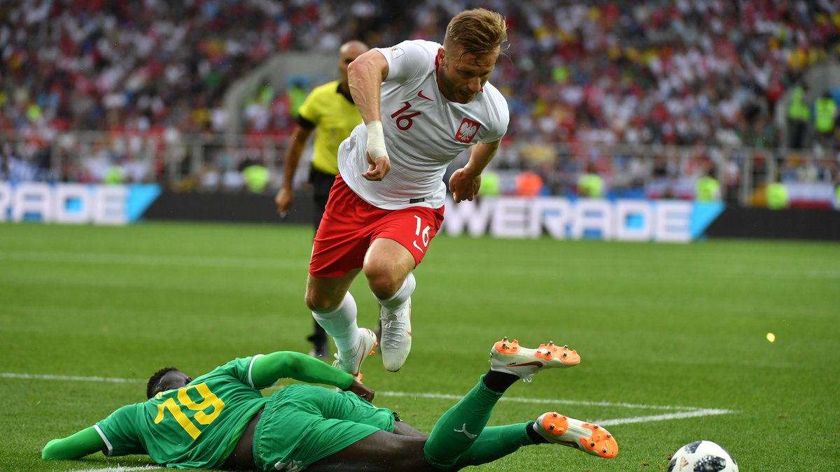 Jakub Błaszczykowski w walce z Mbaye Niangiem