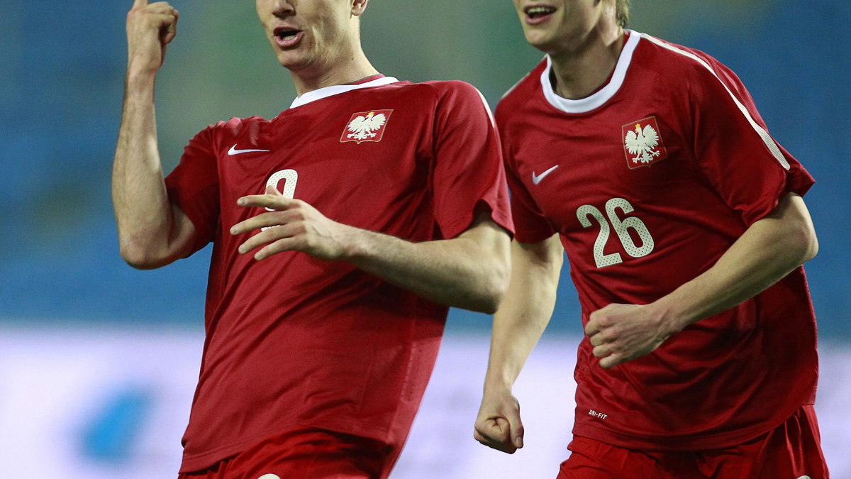 Robert Lewandowski (L) i Łukasz Piszczek (P)