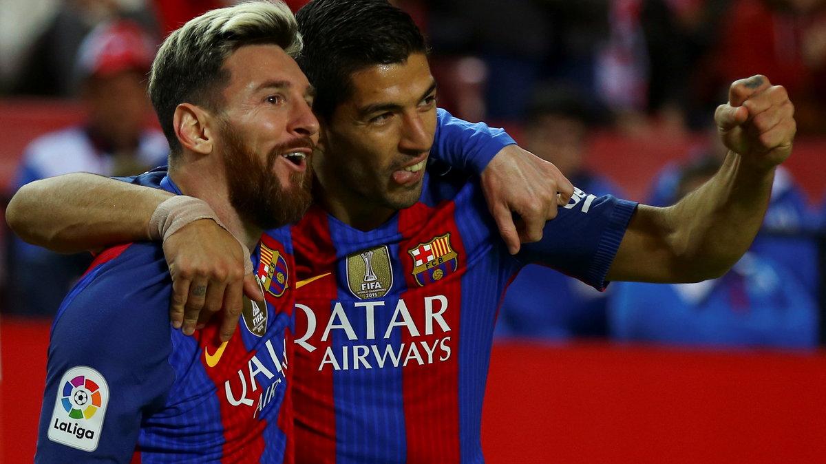 Lionel Messi (L) i Luis Suarez
