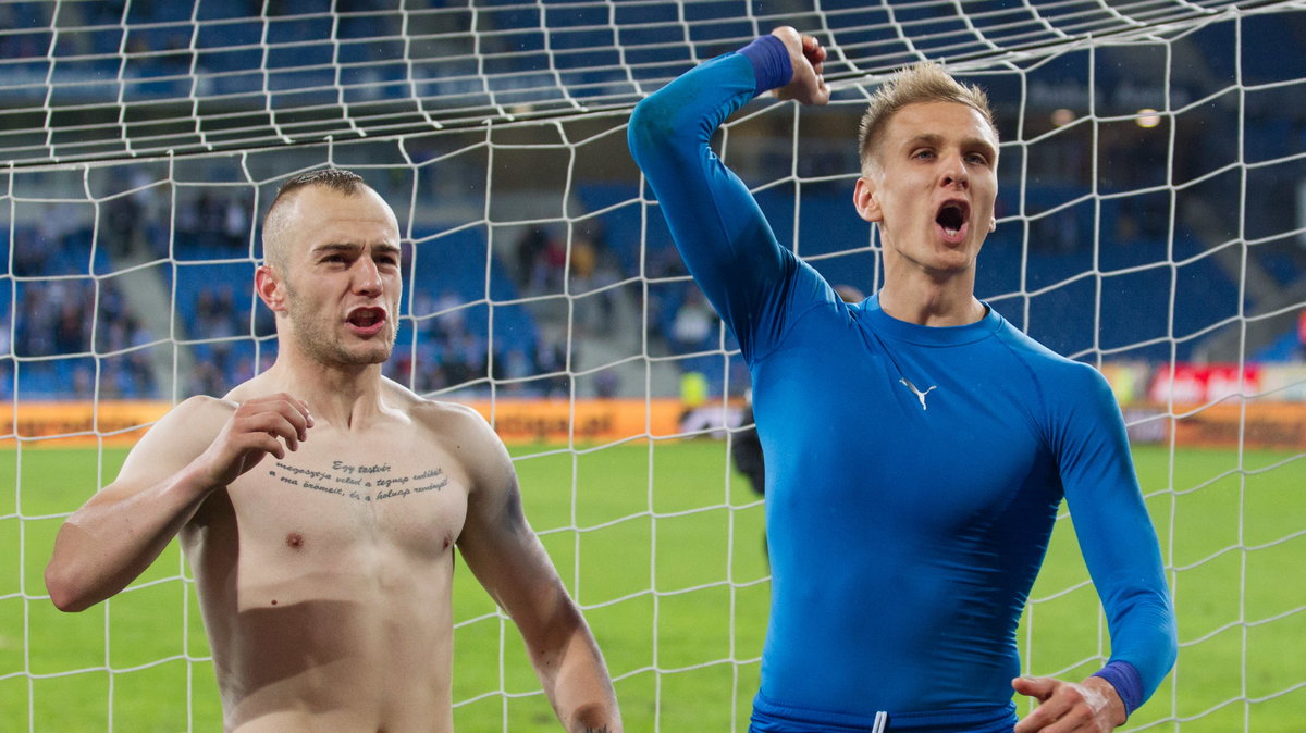 Gergo Lovrencsics (L) i Łukasz Teodorczyk