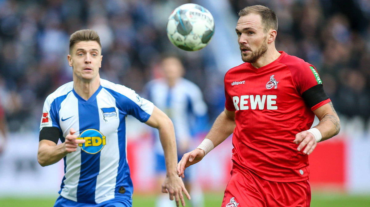 Krzysztof Piątek (Hertha Berlin) i Rafael Czichos (FC Köln)