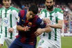 Barcelona's player Luis Suarez fights for the ball against Cordoba's Jose Angel Crespo during their Spanish First division soccer match at Camp Nou stadium in Barcelona