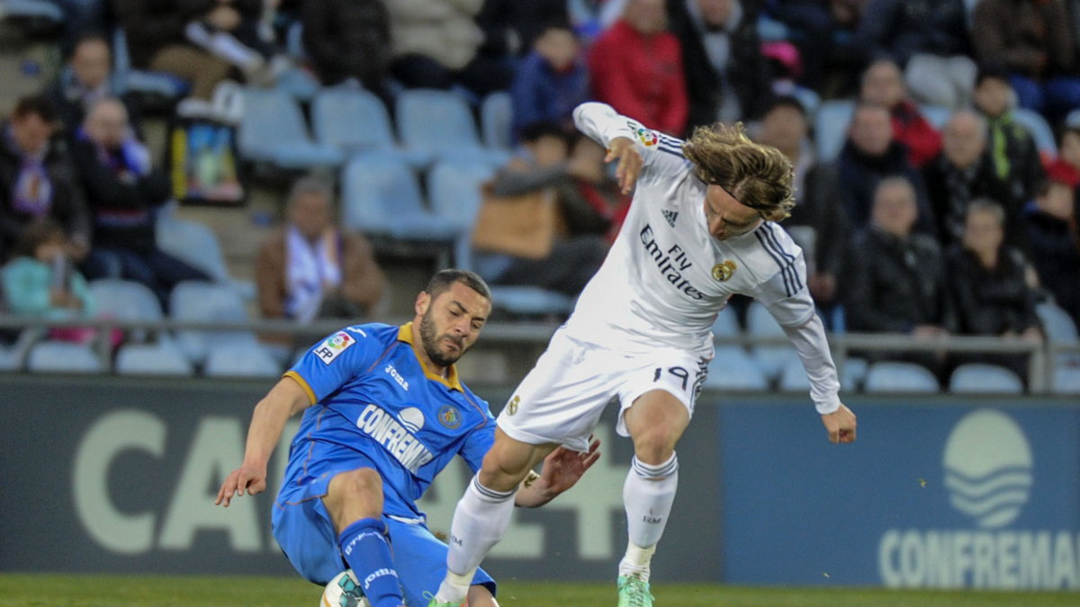 Luka Modrić (P) i Medhi Lacen