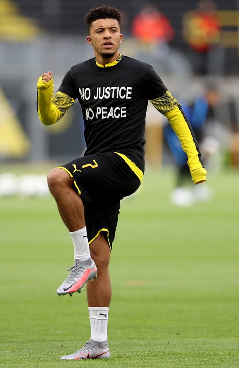 Jadon Sancho, Lars Baron  POOL  AFP