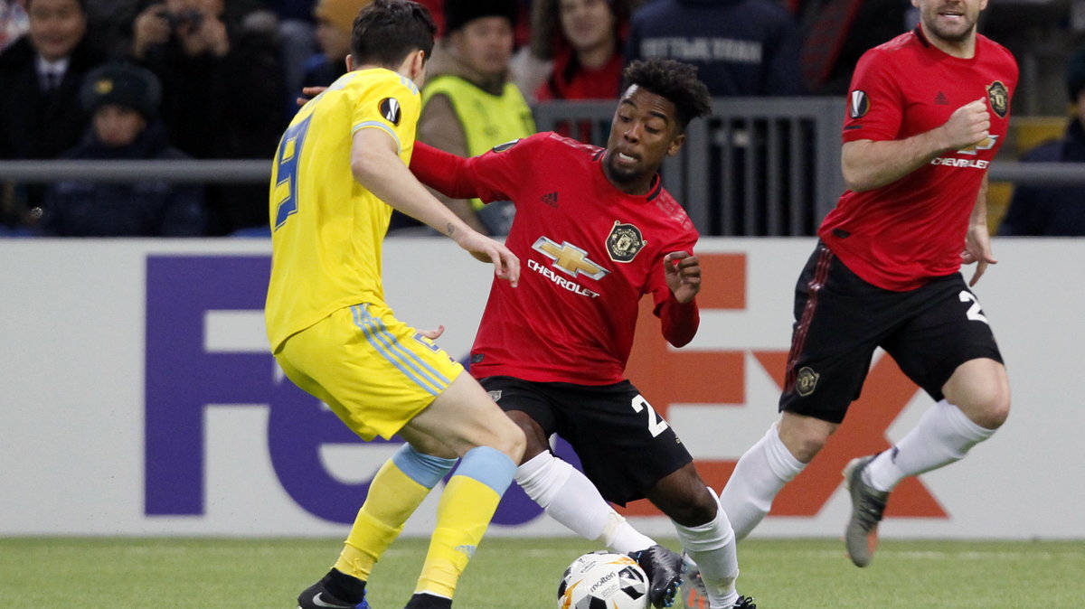 Dorin Rotariu (FK Astana) i Angel Gomes (Manchester United)