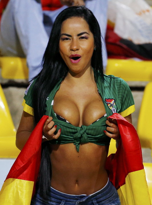 A Bolivia fan celebrates ahead of her team's first round Copa America 2015 soccer match against Mexico at Estadio Sausalito in Vina del Mar