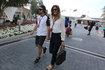 McLaren Formula One driver Fernando Alonso of Spain and girlfriend Lara Alvarez arrive ahead of the third free practice session of Abu Dhabi F1 Grand Prix at the Yas Marina circuit in Abu Dhabi