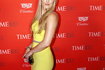 American alpine ski racer Lindsey Vonn poses for photographers on the red carpet as she arrives for the TIME 100 Gala in Manhattan