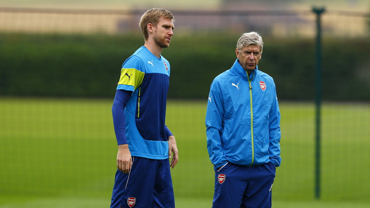 Per Mertesacker i Arsene Wenger