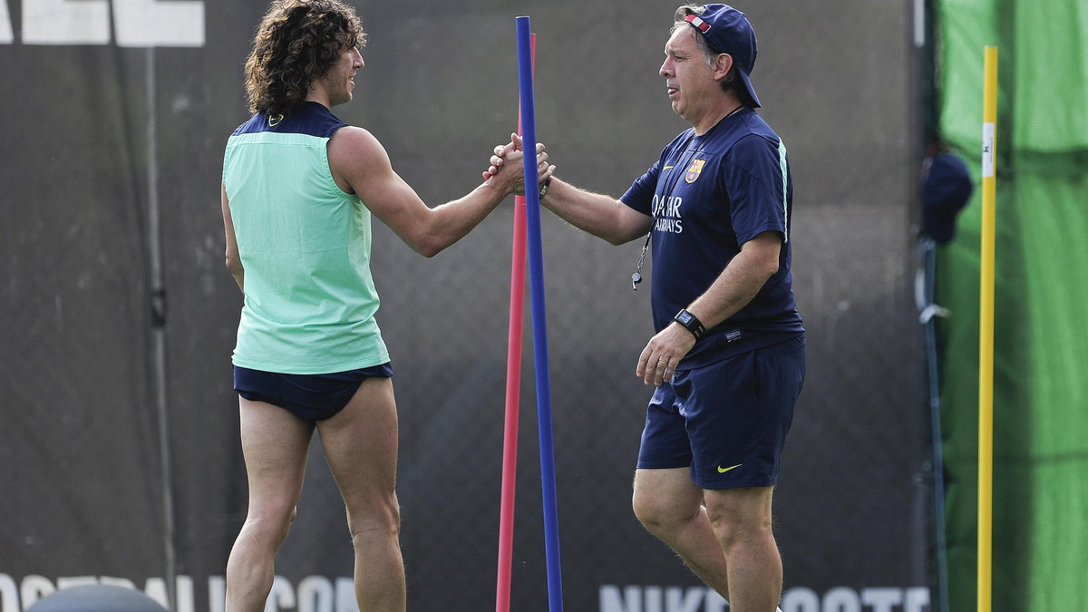 Carles Puyol i Gerardo "Tata" Martino