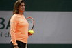 Former tennis player Mauresmo looks at her player Britain's Murray during a training session for the French Open tennis tournament at the Roland Garros stadium in Paris