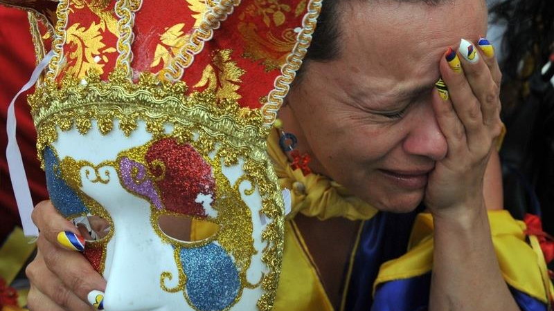 Colombian fan cries in Bogota