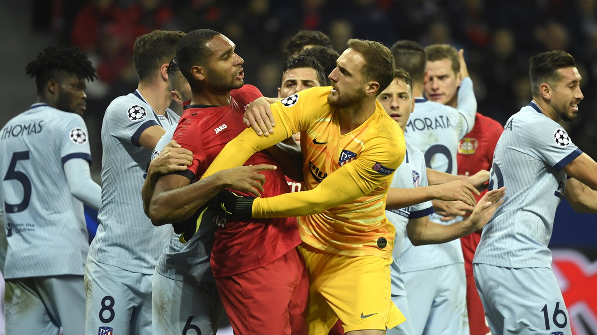 Jan Oblak (Atletico Madryt) i Jonathan Tah (Bayer Leverkusen)