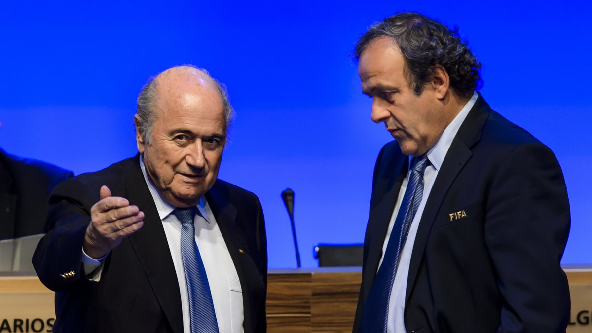 Dwaj najważniejsi ludzie w światowej piłce zostali wykluczeni z futbolowej rodziny, fot. Fabrice Coffrini/AFP