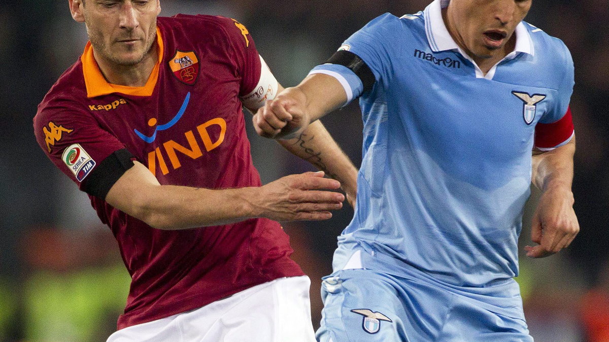 Francesco Totti (L) i Cristian Ledesma (P)