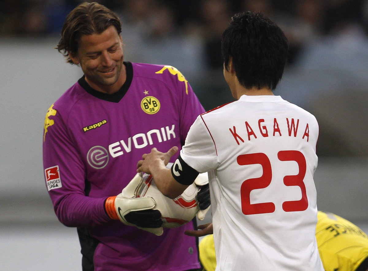 Roman Weidenfeller i Shinji Kagawa (z prawej)