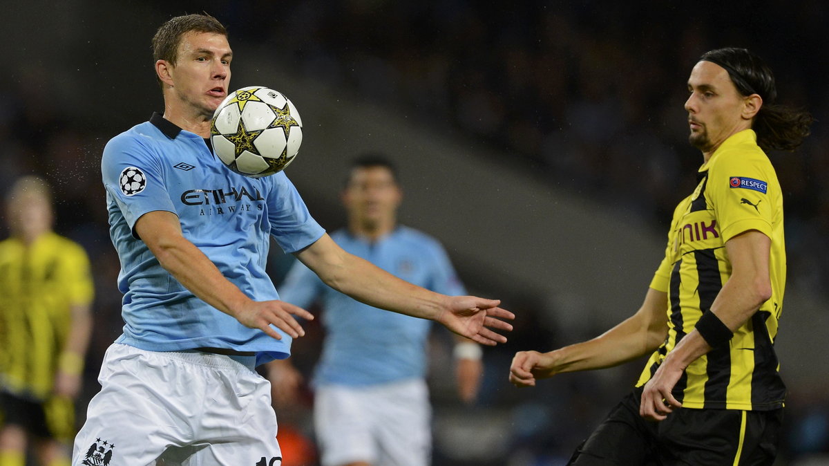 Edin Dzeko (L)