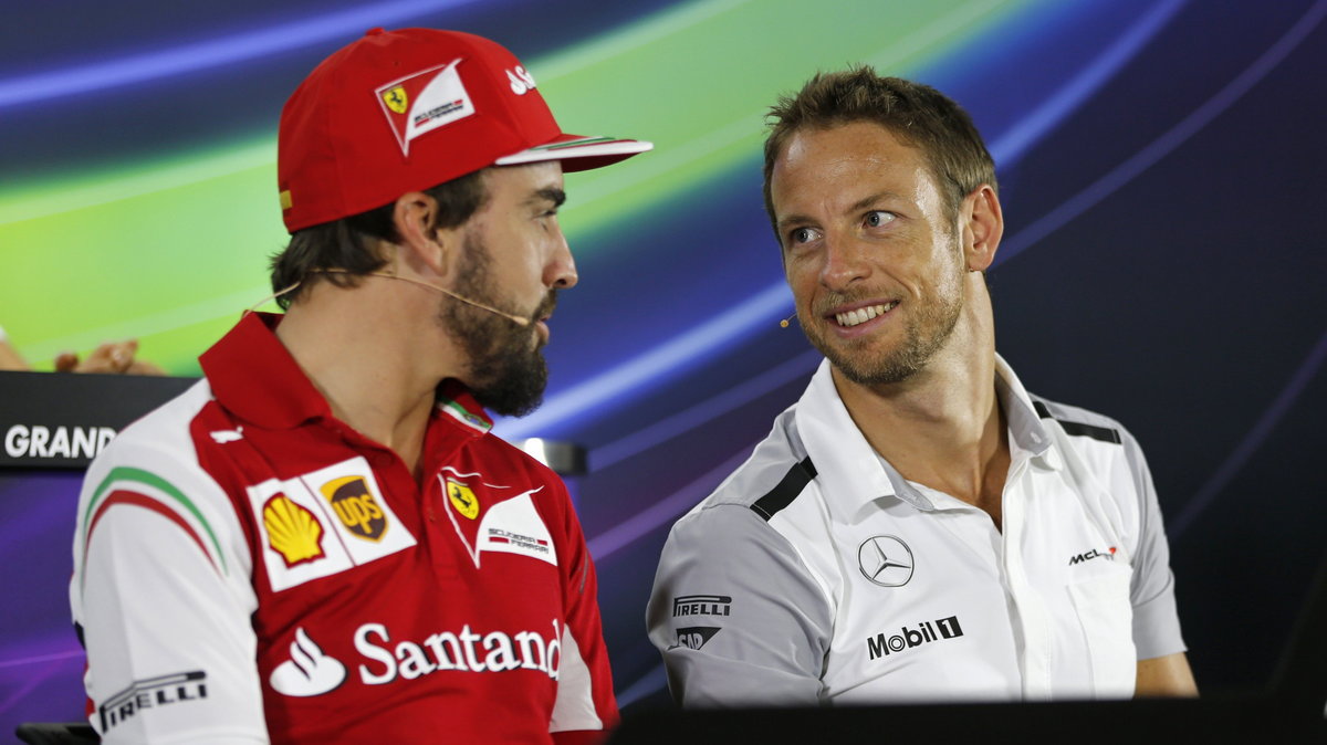 Fernando Alonso (L) i Jenson Button